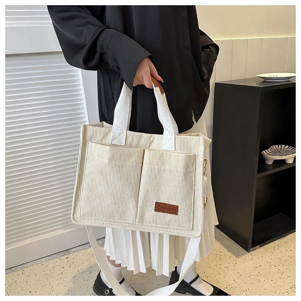 Lightweight white crossbody handbag made of soft corduroy fabric