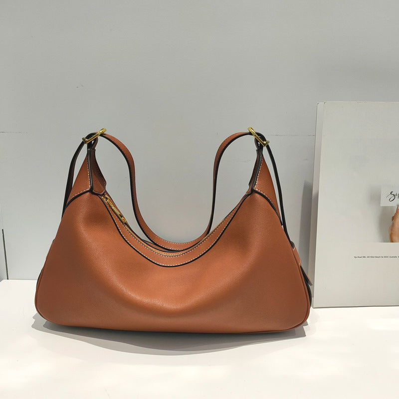 Fashion leather one-shoulder bag with chain detail and sleek urban shape