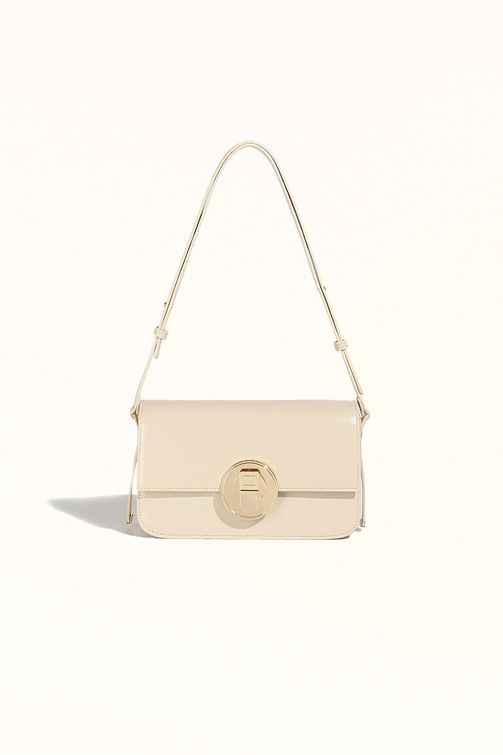 Beige leather shoulder bag with minimalist style and cowhide texture