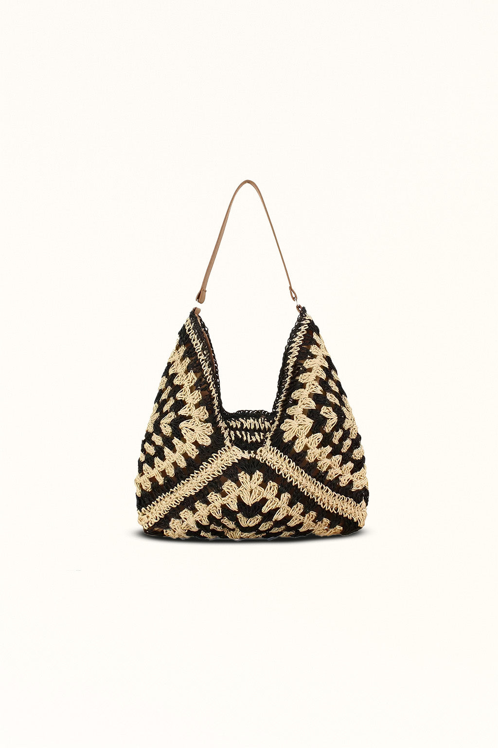 Black straw tote bag with elegant top handle and beach-ready structure