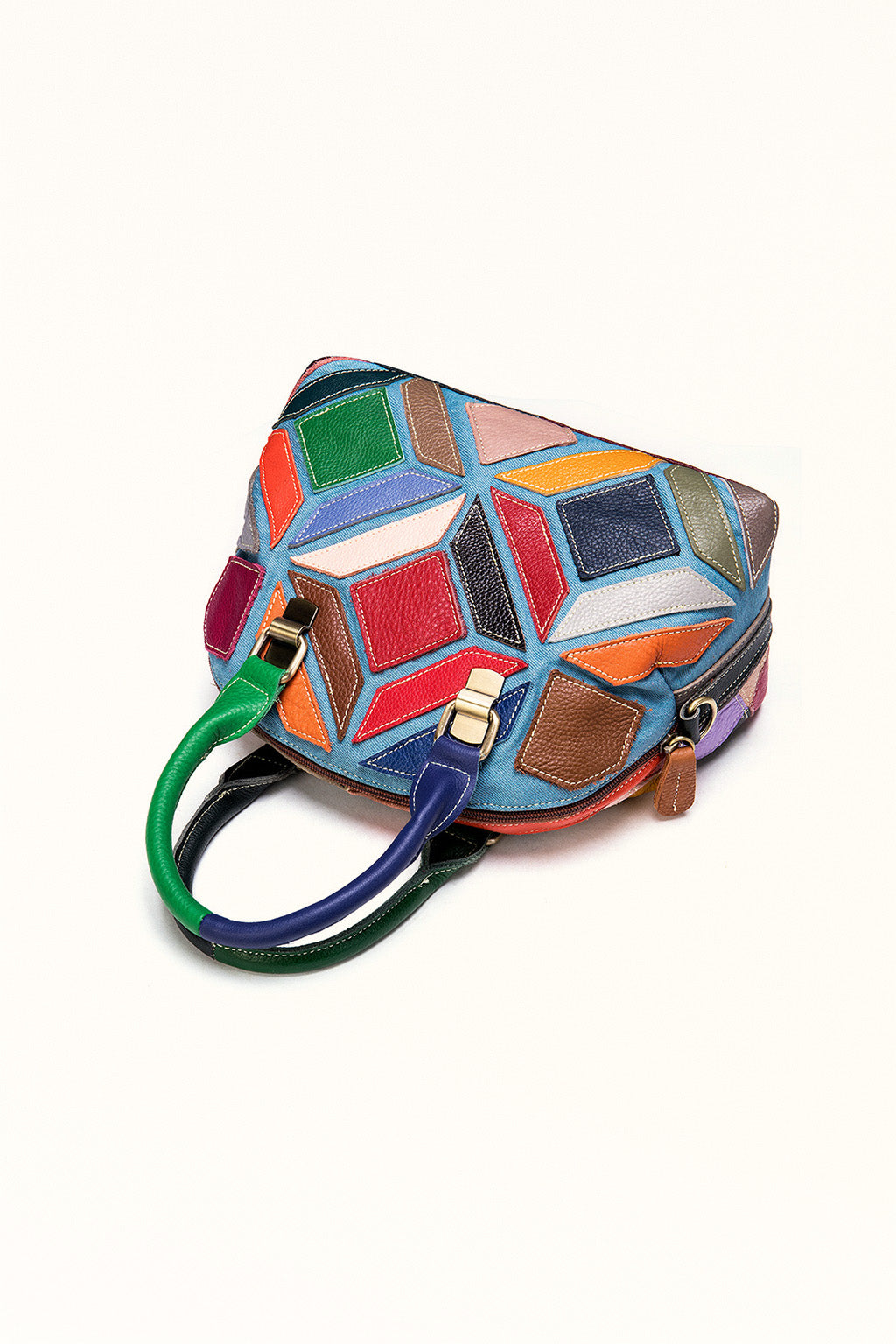 Multi-color cowhide dumpling-style handbag with casual crossbody strap