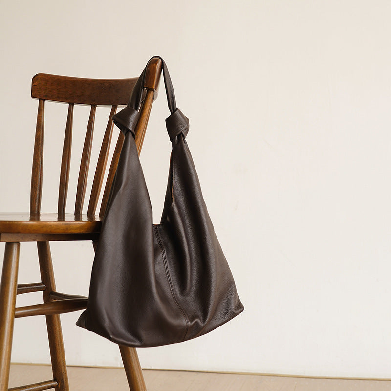 Soft cowhide underarm bag in coffee tone with single strap and open pocket