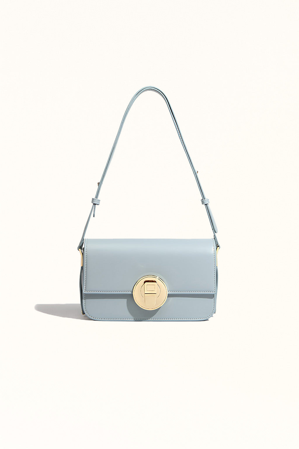 Light blue cowhide messenger bag with lock closure and square shape