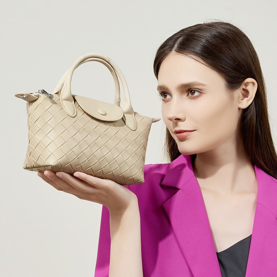 Compact milky white woven leather bag with urban design and 3D pocket