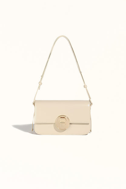 Beige leather shoulder bag with minimalist style and cowhide texture