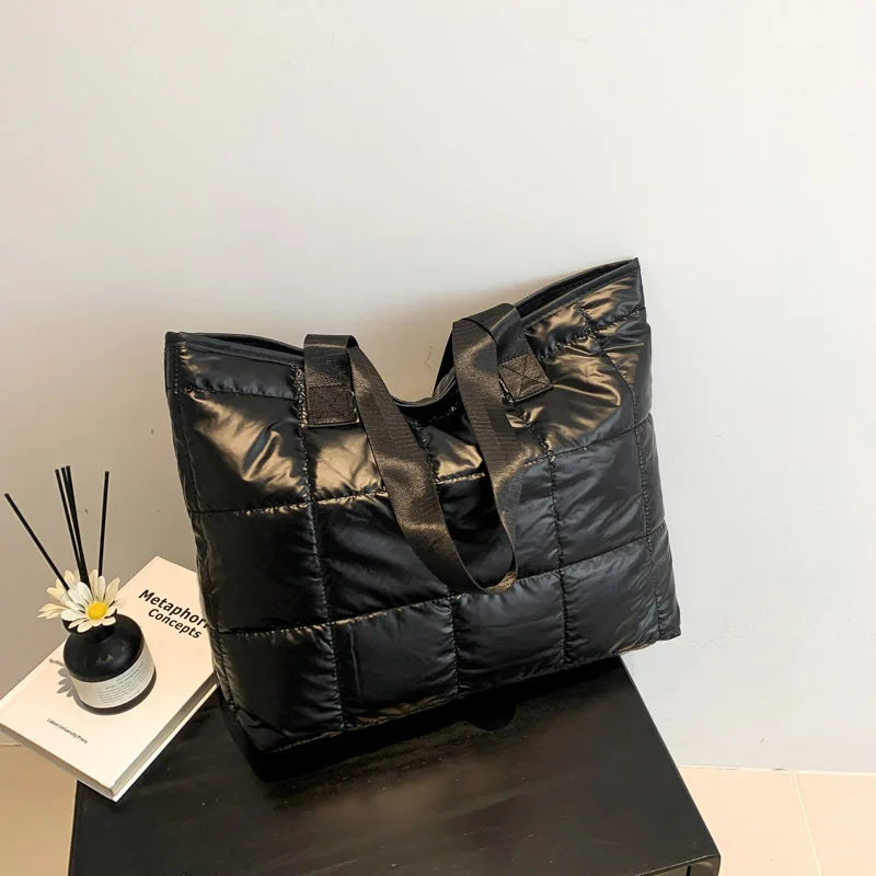 Large black shoulder handbag with casual style and ample storage