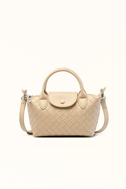 Milky white cowhide leather crossbody bag with woven texture and soft shape