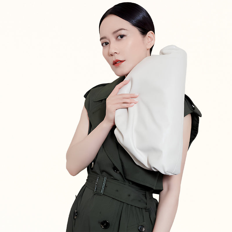 Fashion-forward white PU bag with dumpling shape and leisure vibe